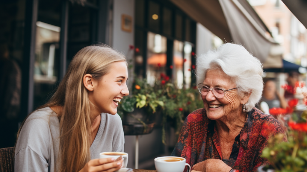 Meisje en oudere vrouw drinken lachend koffie op GivingTuesday